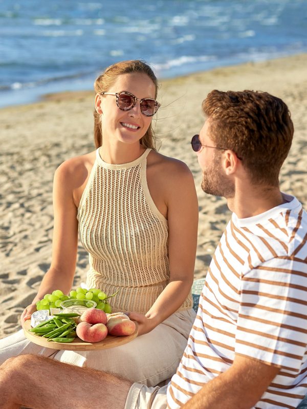 man-and-woman-on-beach-in-sand-crop